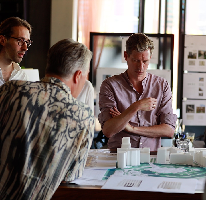 Architects discussing the overall design of the Think District.